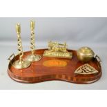 A Victorian wooden kidney shaped tray with brass handles and inlaid shell motif, together with a