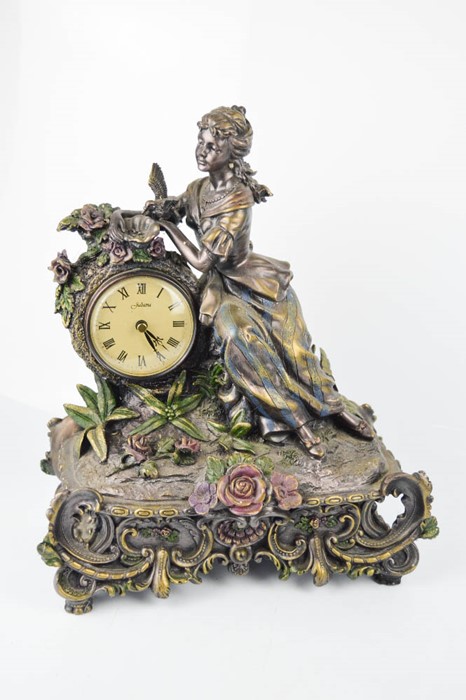 A Juliana clock, modelled with a figure, 36cm high.