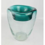 A glass vase, with green rim.
