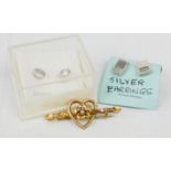 A 9ct gold sweetheart brooch, 1g, and two pairs of silver earrings.
