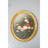 J. Cooper, an oval oil on canvas depicting still life of roses, 50 by 39cm.