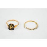 A 9ct gold mourning ring, bearing the initial P, and an 18ct gold ring A/F 1.9g.