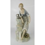 A Nao Lladro figurine; girl with water jug, 34cm high.