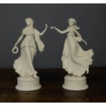 A pair of Wedgwood figures 'The Dancing Hours'.
