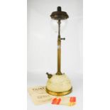 A vintage Tilley table lamp.