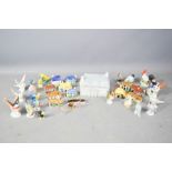 A group of ceramic animals, birds and houses circa 1960s.