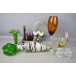 A group of coloured glass to include murano fish, basket, vases, Avon glass bottle and others.