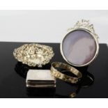 A group of silver to include snuff box, photo frame, bon bon dish, bangle.