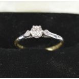 An 18ct gold and platinum set diamond ring, the diamond in illusion setting, 2g.
