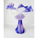 A large Czechoslovakian glass vase, with glass flowers, 41cm high.