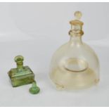 A Victorian green glass bottle, and an insect catcher.