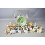 A quantity of Wade whimsies, including Humpty Dumpty, Coronation, dish, and three elephants.