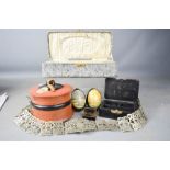 A quantity of boxes to include Russian, eggs, snow scene, snake skin box, miniature snuff box.