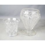 Three cut glass crystal vases.