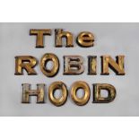 A group of nine wooden painted and gilded letters for Robin Hood pub sign.