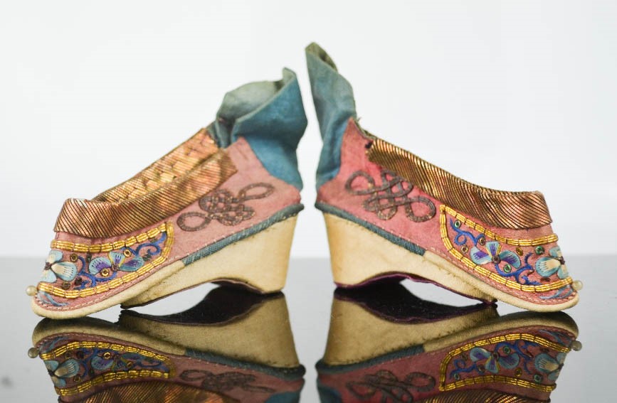 A 19th century Chinese pair of votive (altar) shoes, hand embroidered to depict flowers, embellished - Image 2 of 2