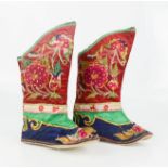 A pair of late 19th century boys celebratory boots, embroidered in satin stich and couching to