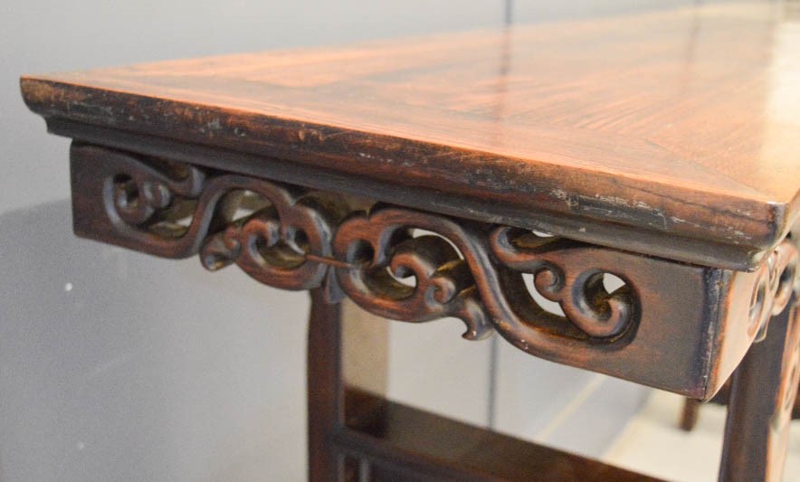 A large hardwood altar table, carved and pierced to the sides, 104 by 210 by 45cm. - Image 2 of 2