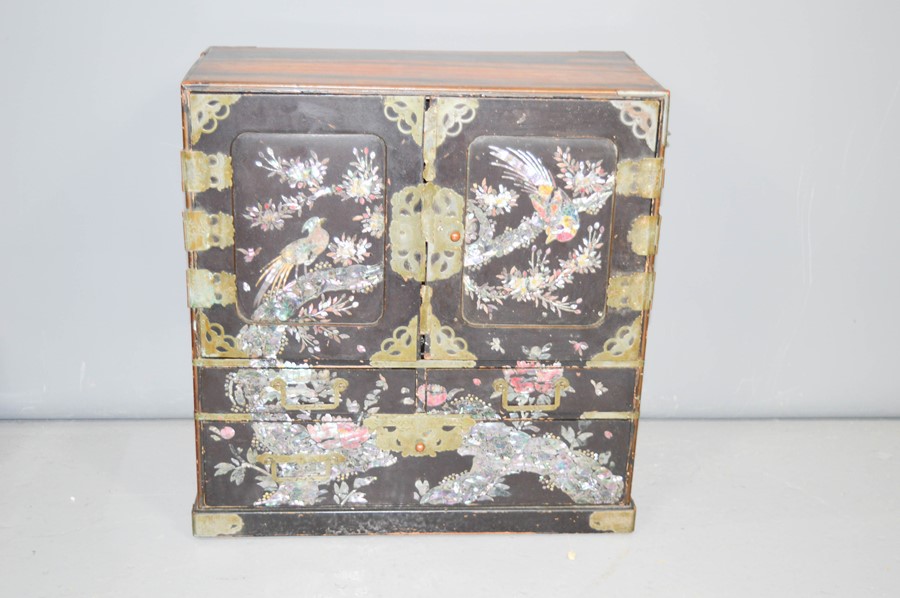 An early 19th century ebonised Chinoiserie decorated cabinet, with mother of pearl inlaid doors, - Image 2 of 3