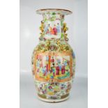 A Chinese canton famille rose vase with raised salamanders and enamelled with figural vistas, 43cm