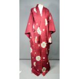 A Japanese Kimono together with a late 19th century Chinese silk robe brocade with ribbon trim, 94cm