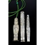 Three 19th century Chinese silver needle cases, including one in the form of a Chinese figure. [