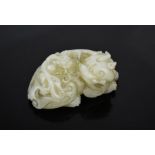 A white jade carved mystical beast, 7.5cm long