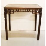 A Chinese table, with pierced sides, 76 by 76 by 50cm.