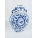A Chinese 20th century blue and white moon flask, transfer ware, seal mark to the base, 31cm high.