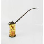 An early 19th century Chinese opium pipe, yellow ground with red calligraphy, 10m high.