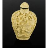 A Chinese carved snuff bottle carved with landscape.