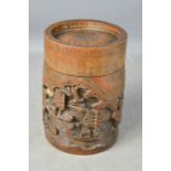 A 19th century bamboo carved brush pot with lid, relief carved, depicting fishermen in boats, 17cm