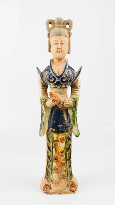 A terracotta glazed figure of a Chinese woman, 33cm high.