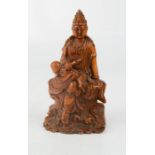 A Chinese hand carved boxwood Guan Yin Bodhisattva figure. 10cm by 5cm.