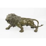 A Japanese bronze figure of a lion, unsigned.