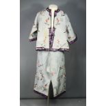 A Chinese silk hand embroidered jacket with matching trousers, circa 1930, in grey embroidered