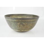 A Chinese bronze bowl cast with dragons and peacocks to the side panels, Xuande marl to the base. [