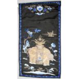 A late 19th century wall hanging, depicting an elephant, San Lan (three blues) embroidery and