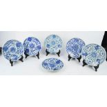 Six late 18th / early 19th century Chinese ship wreck plates in blue and white, together with
