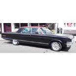 A 1965 Chrysler New York pillarless, 74 big block moper 440 engine.