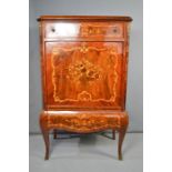 A marquetry inlaid drinks cabinet, with floral urns 126 by 77 by 45cm.