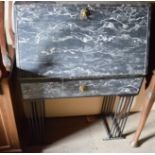 A French style bureau, faux marble, with gilt metal handle, raised on metal frame, 35 by 124 by