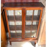 A mahogany glazed display cabinet 109 by 71cm.