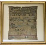 An 18th century sampler dated 1793, with alphabet and verse.