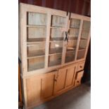 An antique pine sideboard and cabinet 164 by 186cm. A/F
