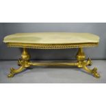 An agate and gold painted metal coffee table, 115cm long, by 50cm high, by 56cm wide.