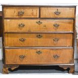 An 18th century walnut veneered chest of drawers, two over three long drawers, bracket feet.