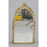 A gold painted arched mirror. 67cms x 35cms