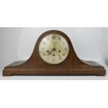 A 1930s oak mantle clock.