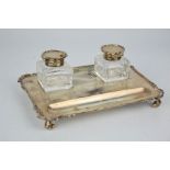 A Goldsmiths & Silversmiths of 112 Regent Street London silver inkstand, with two cut glass and